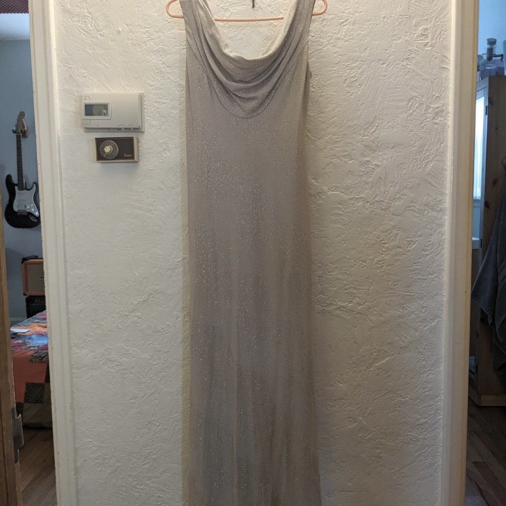 Long formal gold Calvin Klein dress New with tags. Size 4, gold sparkles